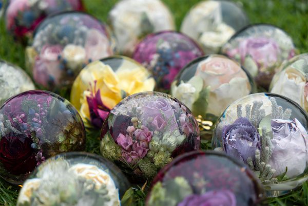 Preserved flower bouquets in resin globes by Flower Preservation Workshop, Somerset