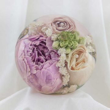 Bridal bouquet in a paperweight, London